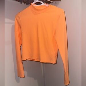 ASOS DESIGN Bright Orange Ribbed High Neck Long Sleeve Crop Top